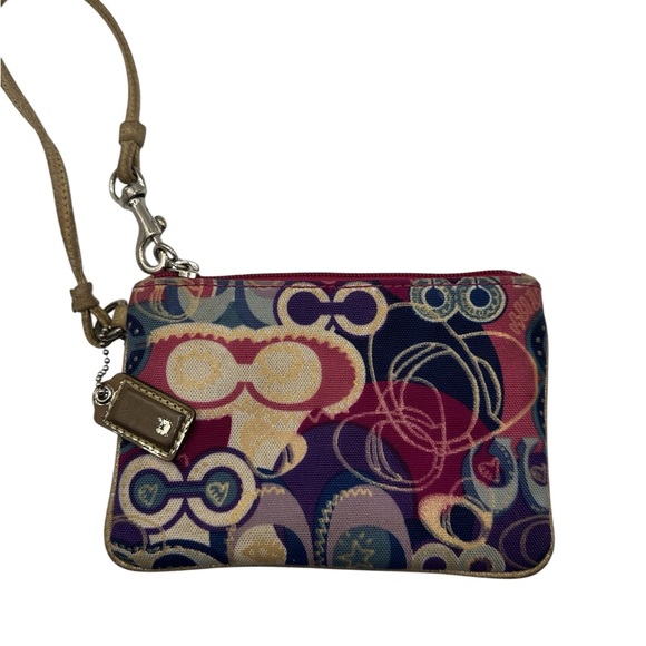 Coach Handbags - Coach Poppy Signature wristlet  mini bag - pink and purple fabric